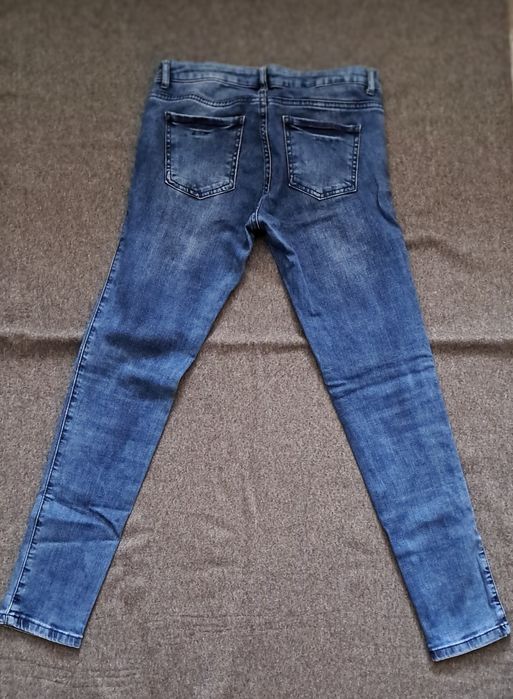 Джинсы фирма Кoton  состояние в идеале,  как новые, размер 26-27