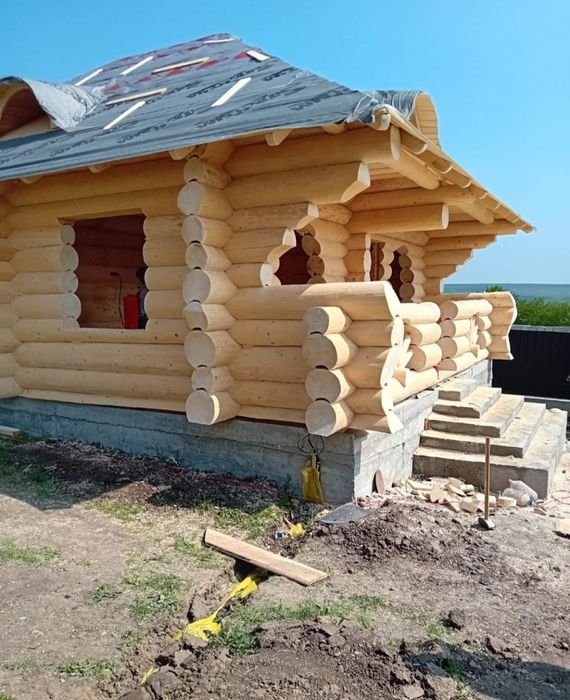 Facem case din lemn rotund