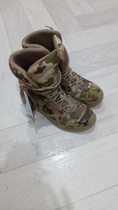 Продаю муж. обувь термо берцы камуфляжные оригинал новые..