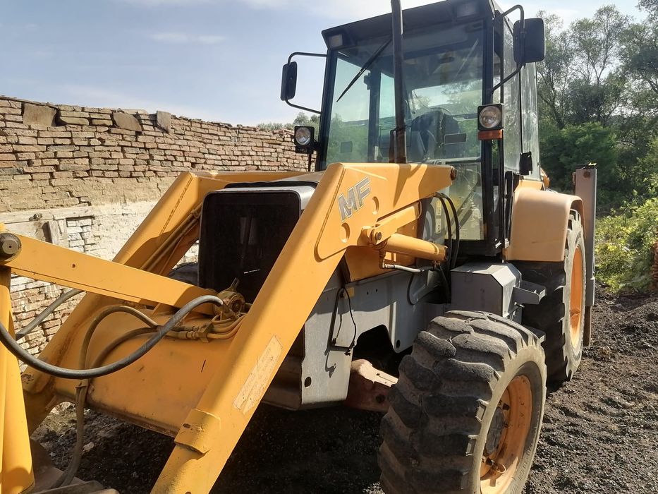 Dezmembrez buldoexcavator terex mf fermec 965 750 860