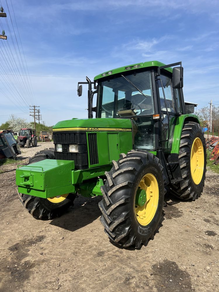 Vand sau schimb tractor John Deere 6400