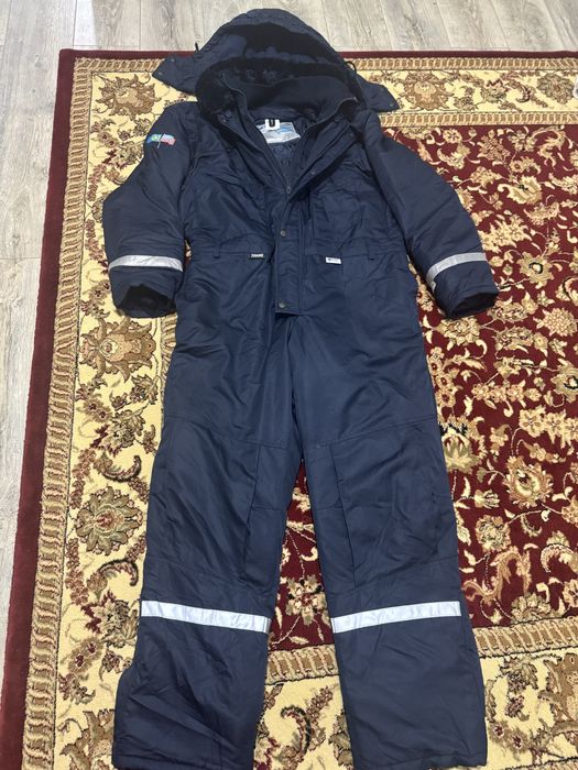 Зимний новый комбинезон, размер XXL. Качество отличное.