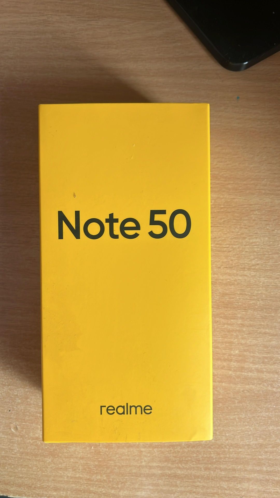 Realmee notee 50