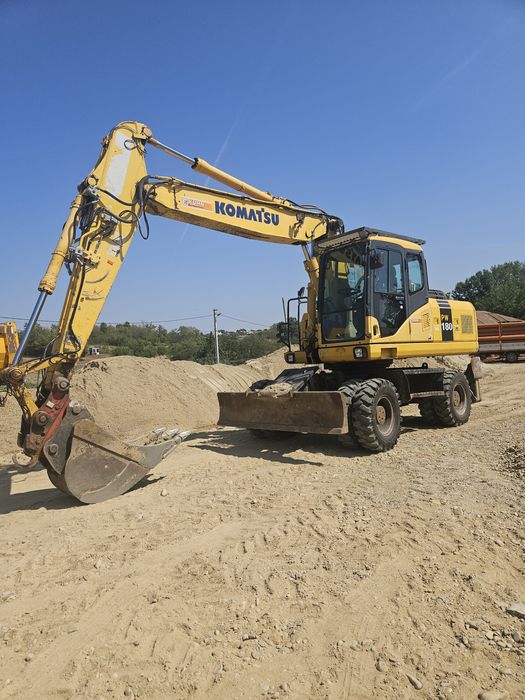 Excavator pe roți komatsu pw 180