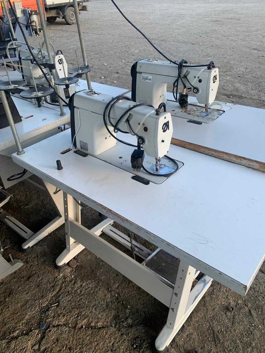 Masini de cusut cu masa