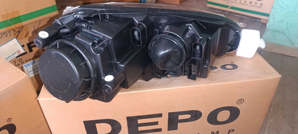 Фар VW Golf 5 03-07