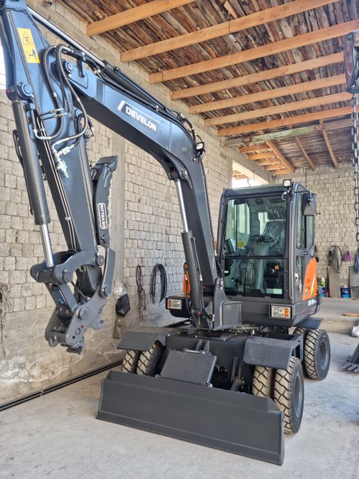 Экскаватор Develon DX60W eco 2025
