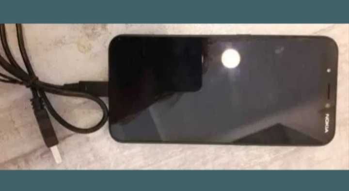 Telefon Nokia C1, ca nou + husa + prinzatoare