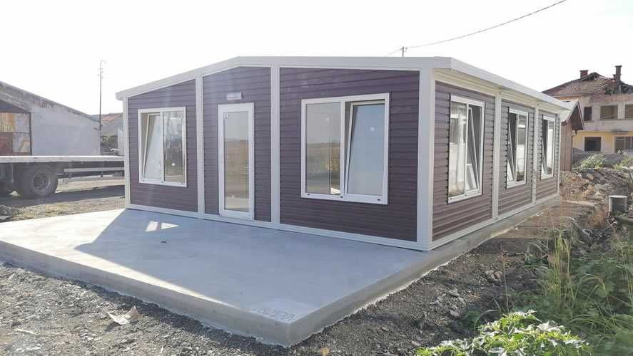 Casa modulara și garaje auto din structura metalica si panou sandwich