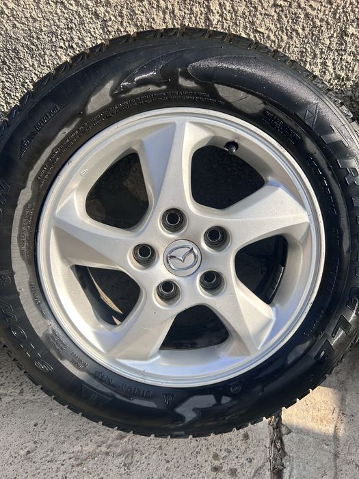 Диски с шинами Мазда 626 TRIANGLE