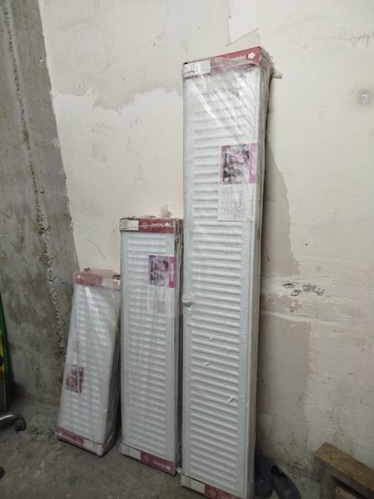 Радиаторы новые белые