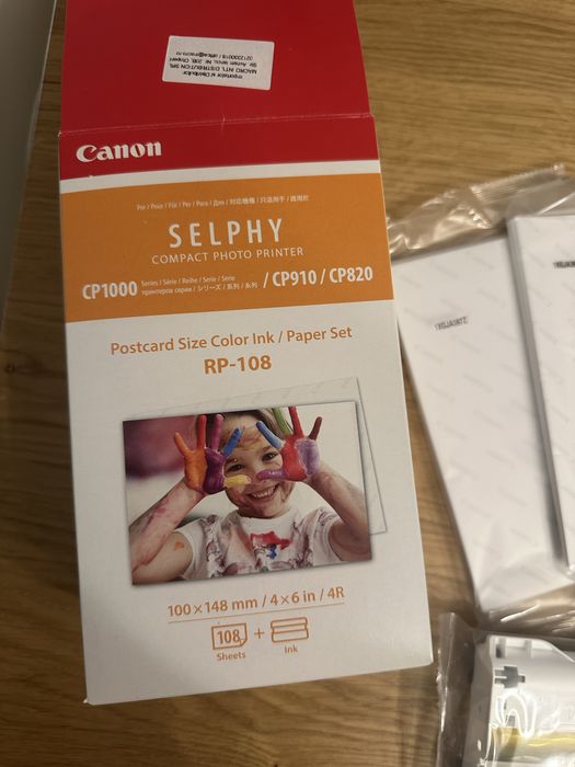 Imprimantă foto Canon SELPHY CP1500 + hârtie Canon RP-108