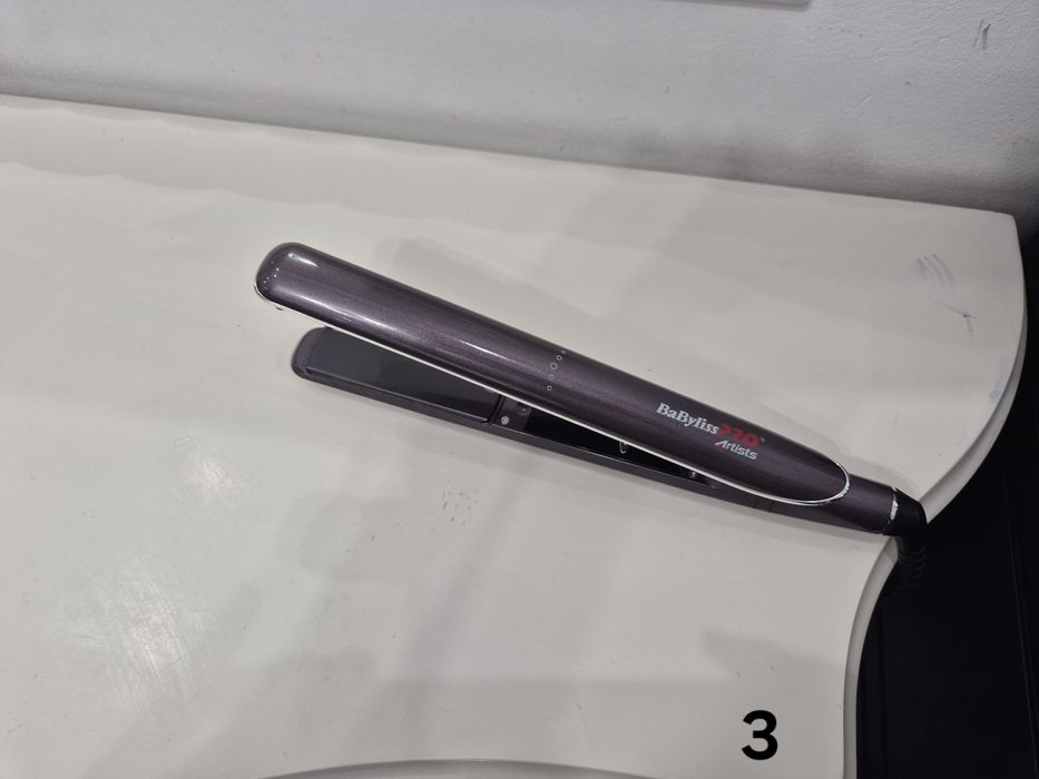 Vand placa de intins parul