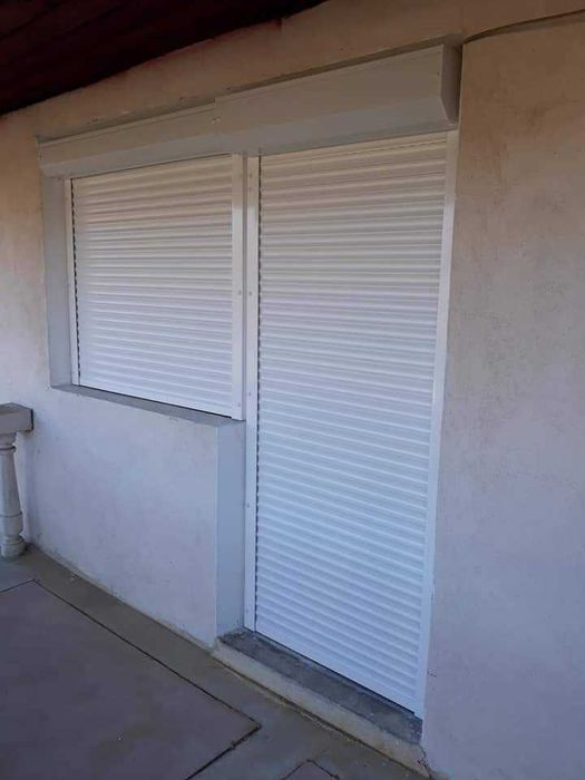 RULOURI Aluminiu si Usi de garaj rezidentiale SECTIONALE