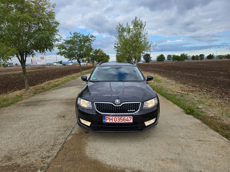 Skoda Octavia Navigatie,Tapiterie Semi-Piele,Senzori Parcare/Lumina/Ploaie