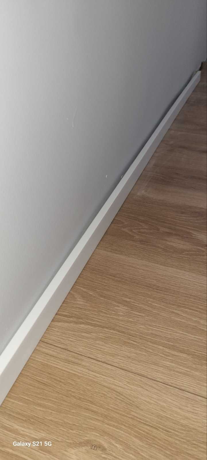 Перваз за под водоустойчив Quickstep Бял 38мм, 2.40м, 64л.м.