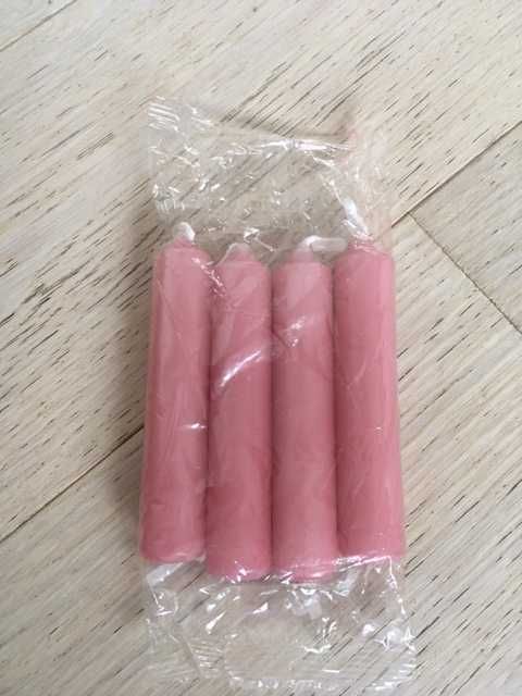 set de patru lumanari roz pentru masa