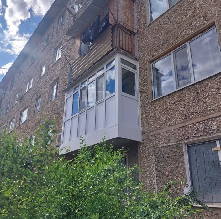 Пластиковые окна двери балконы