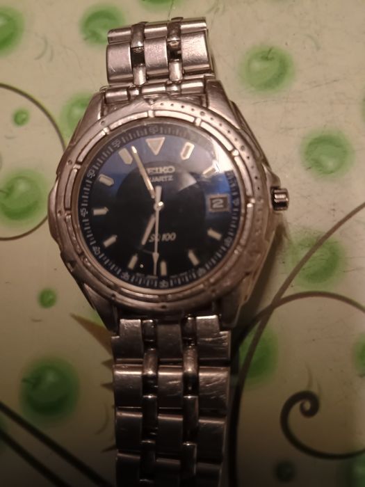 Ceasuri Seiko sq 100 si Swatch irony