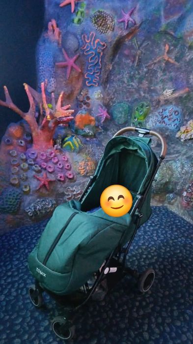 Продам детскую прогулочную коляску tomix. Коляска складывается в чемод