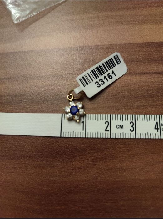 Pandantiv floare din aur 14K ,0,97 gr cu pietre Tanzanit și zirconii