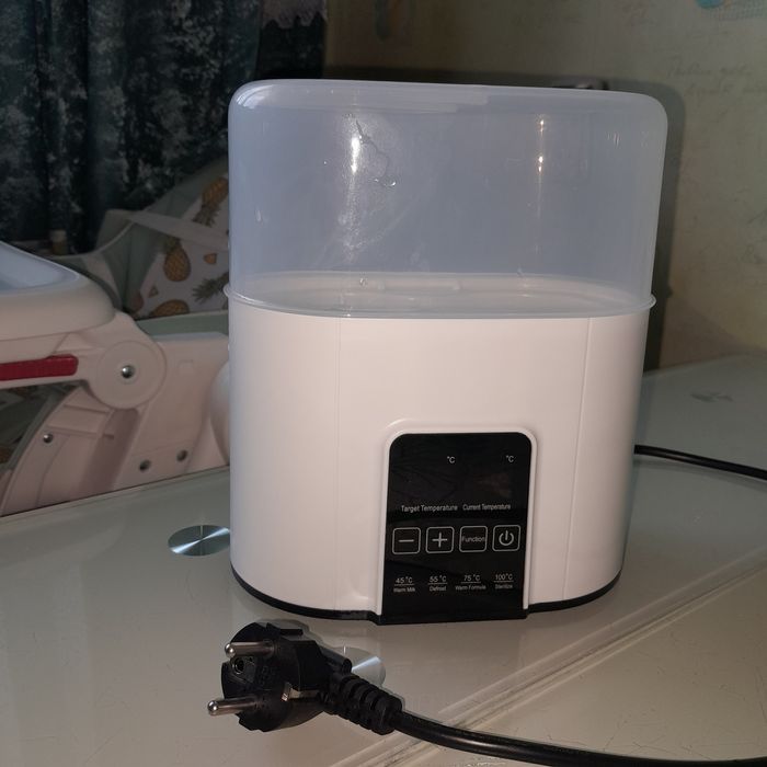 Стерилизатор и подогреватель для детских бутылочек