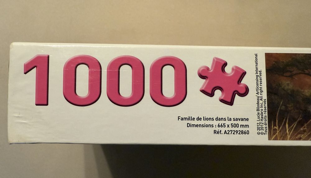 Puzzle 1000 piese Familie de lei in savana - nou