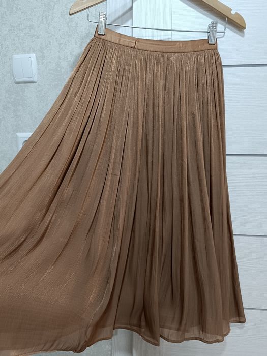 Плиссированные женские юбки