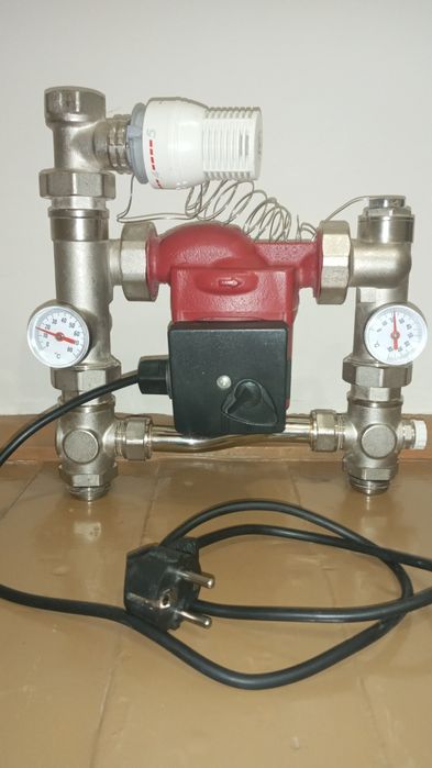 Продам сместительную группу с насосом состояние новое