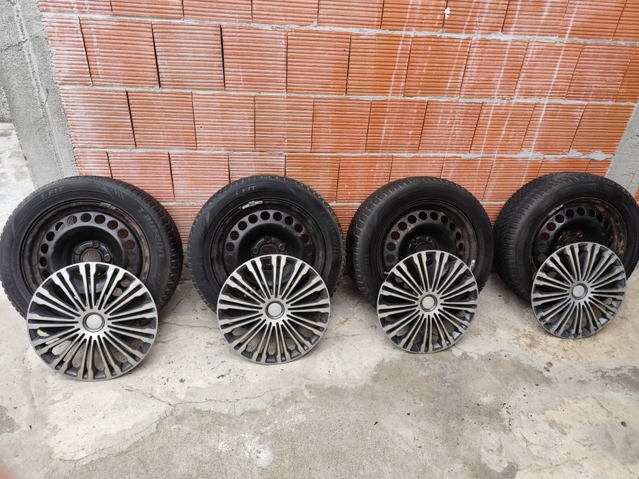 Гуми с подарък джанти и тасове за Opel Astra/Insignia