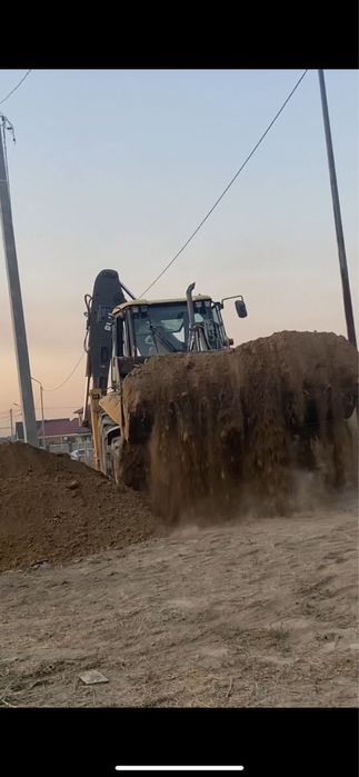 Услуги Экскаватор погрузчика  3в1 смена 110 тысяч