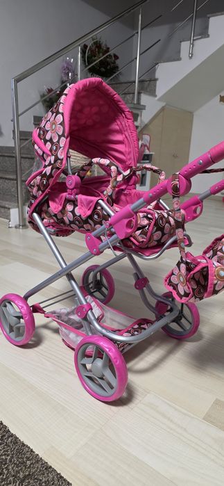 Cărucior păpuși roz