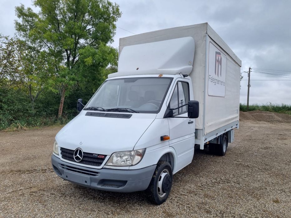 Mercedes sprinter 416 cu bena ficsa cu prelata care se inalta .