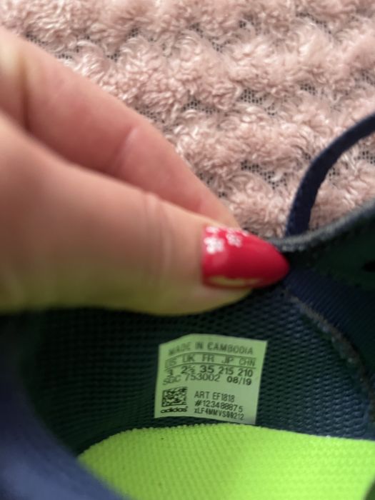 Маратонки Nike и Adidas