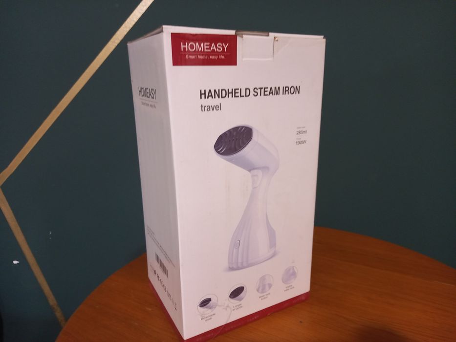 Aparat de calcat vertical cu abur