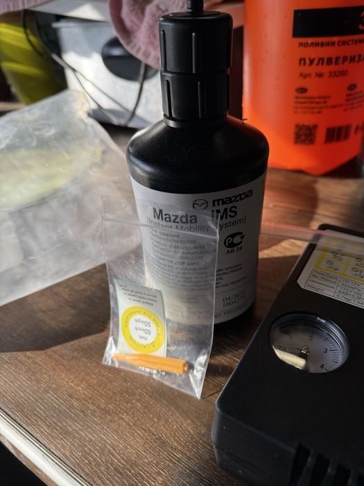 Авариен комплект компресор за гуми Mazda