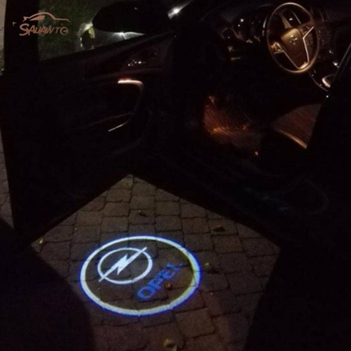 Proiectoare logo portiera cu orice marca ! VW BMW Audi Opel Dacia