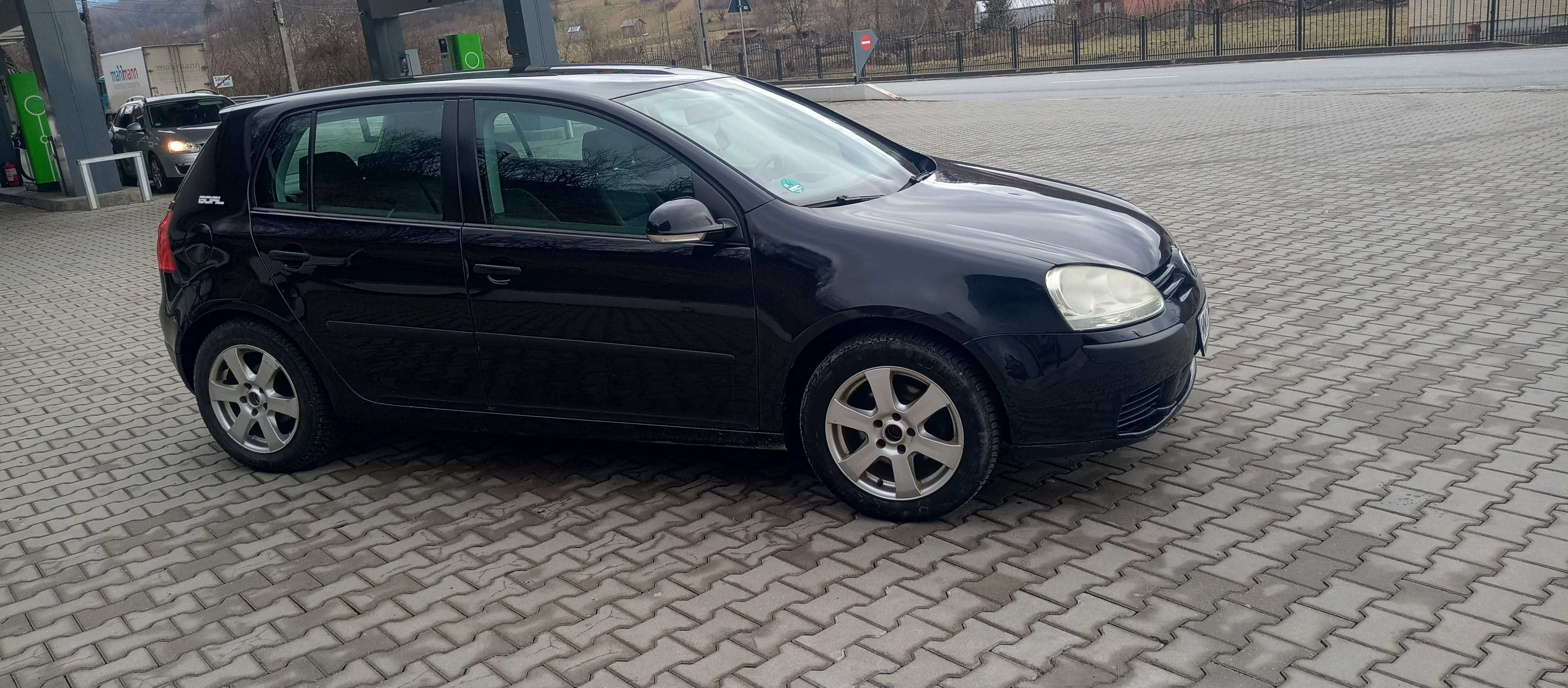 Golf 5,an 2005,motor 1.4 benzină