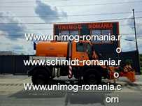 UNIMOG mulag tăiat iarba și bazin de apa