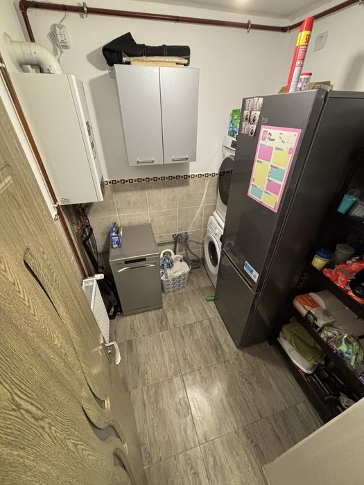 Casa de mijloc dintr-un triplex