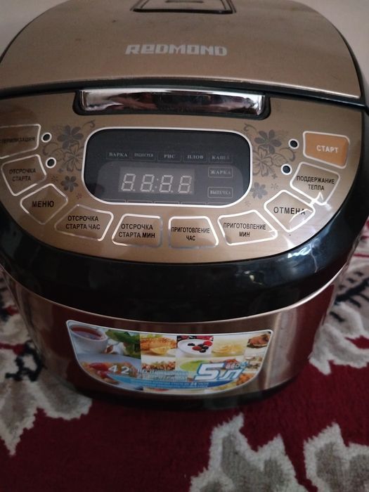 Multivarka kafolati bilan deyarli yangi