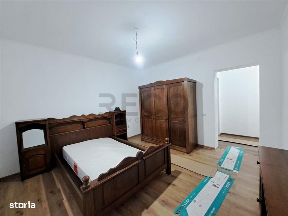 Apartament cu 3 camere , decomandat , cu 2160 mp teren intravilan