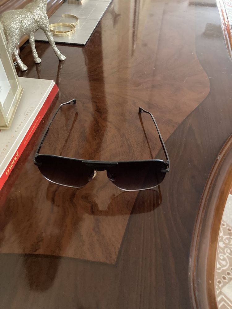 Vand ochelari maybach putin folositi