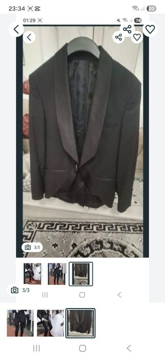 Vând costum Firma Gherasos impecabil