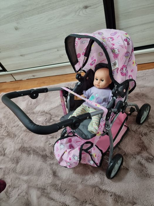 Carucior de jucarie +geanta + bebe