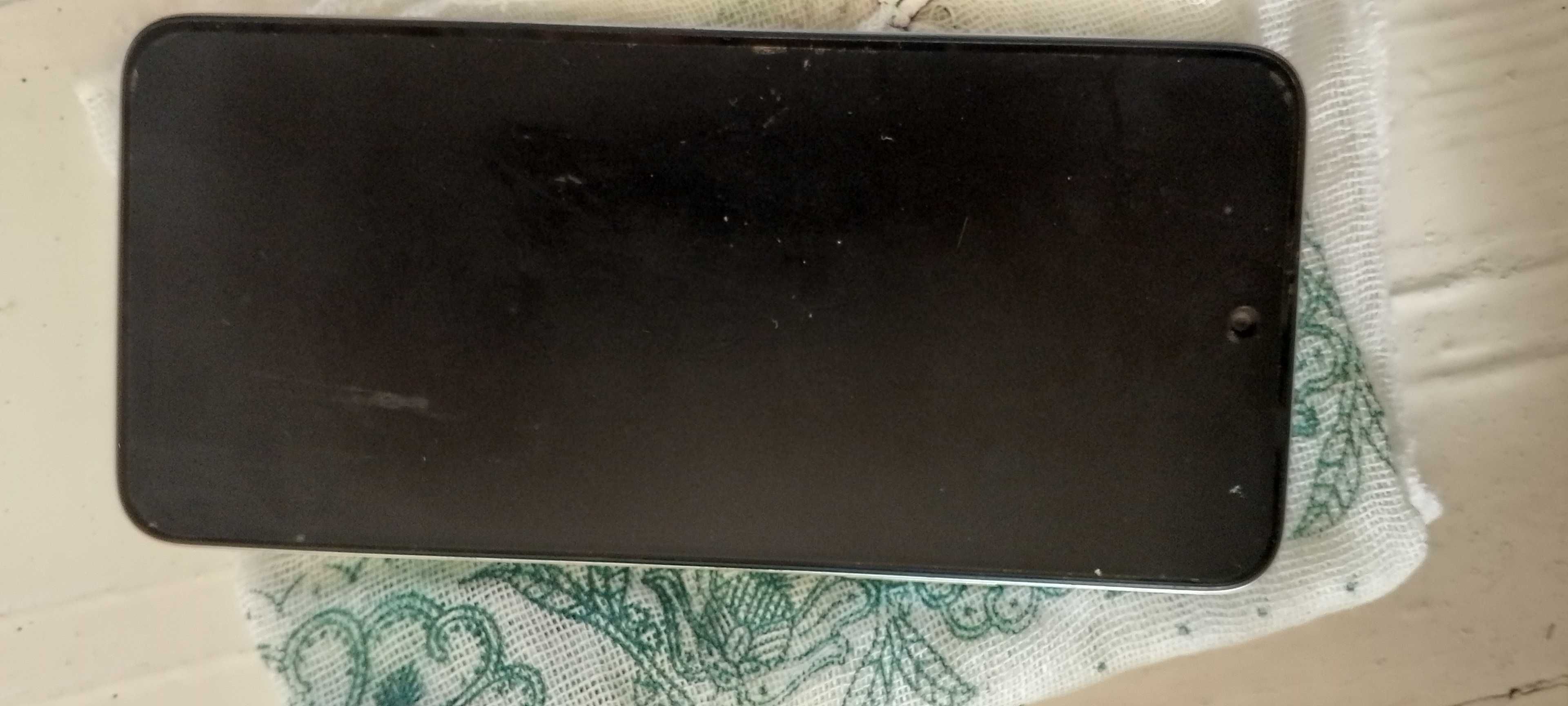 Redmi.        12