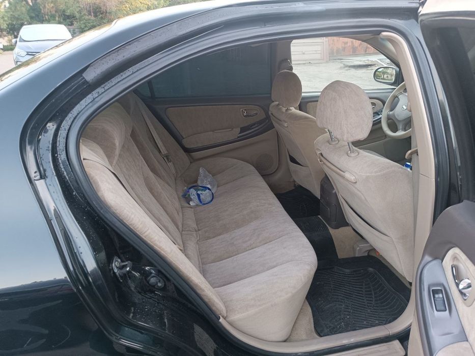 Nissan Maxima чёрный свет