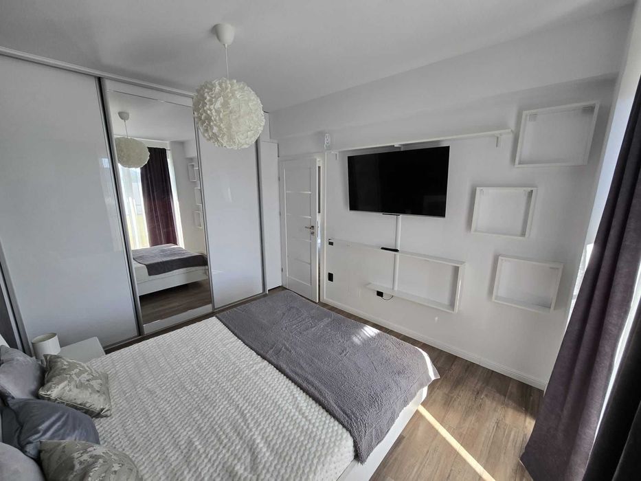 Se inchiriaza Ap. 2 camere + parcare subterana in zona centrala