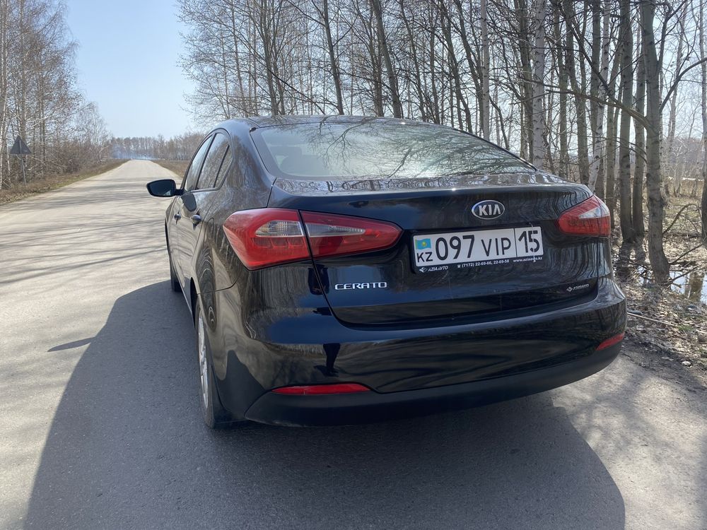 Kia cerato 2013 год.