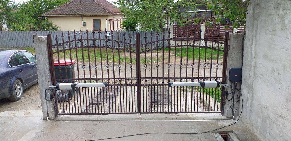Uși de garaj rezidențiale si industriale, automatizări pt porti